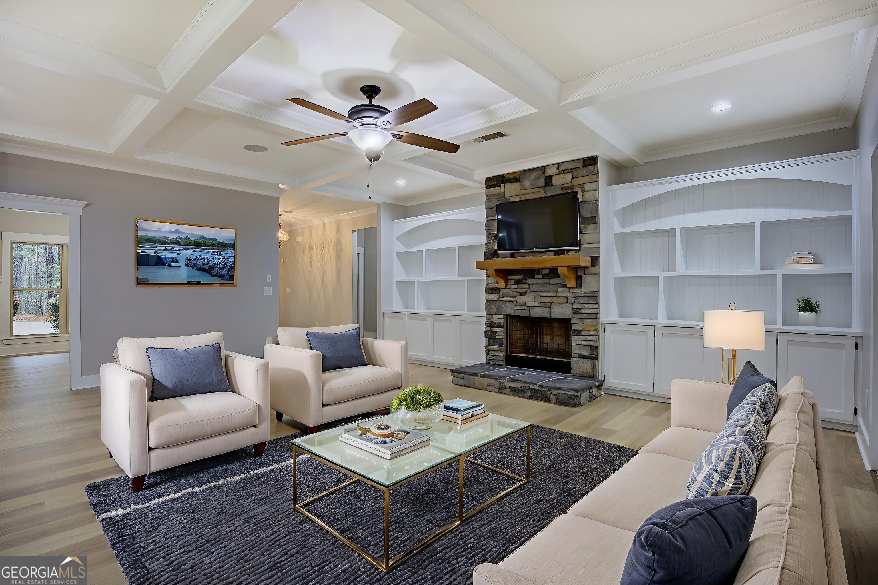 284 Sowell Road McDonough, GA 30252 - Photo 7 of 48 a living room with furniture and a fireplace