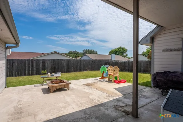 a garden view with a seating space