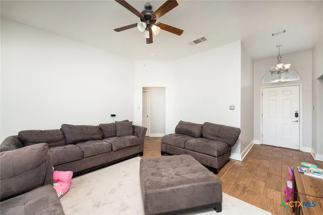 a living room with furniture and a couch