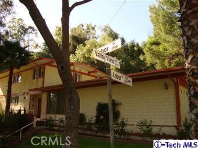 1675 Valley View Road Glendale, CA 91202 - Photo 1 of 1 a front view of a house with garden