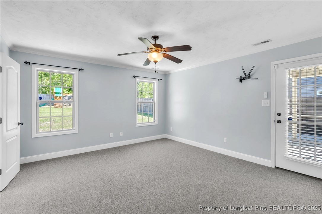 510 Hammond Farms Road Hope Mills, NC 28348 - Photo 16 of 49 a view of an empty room with a window