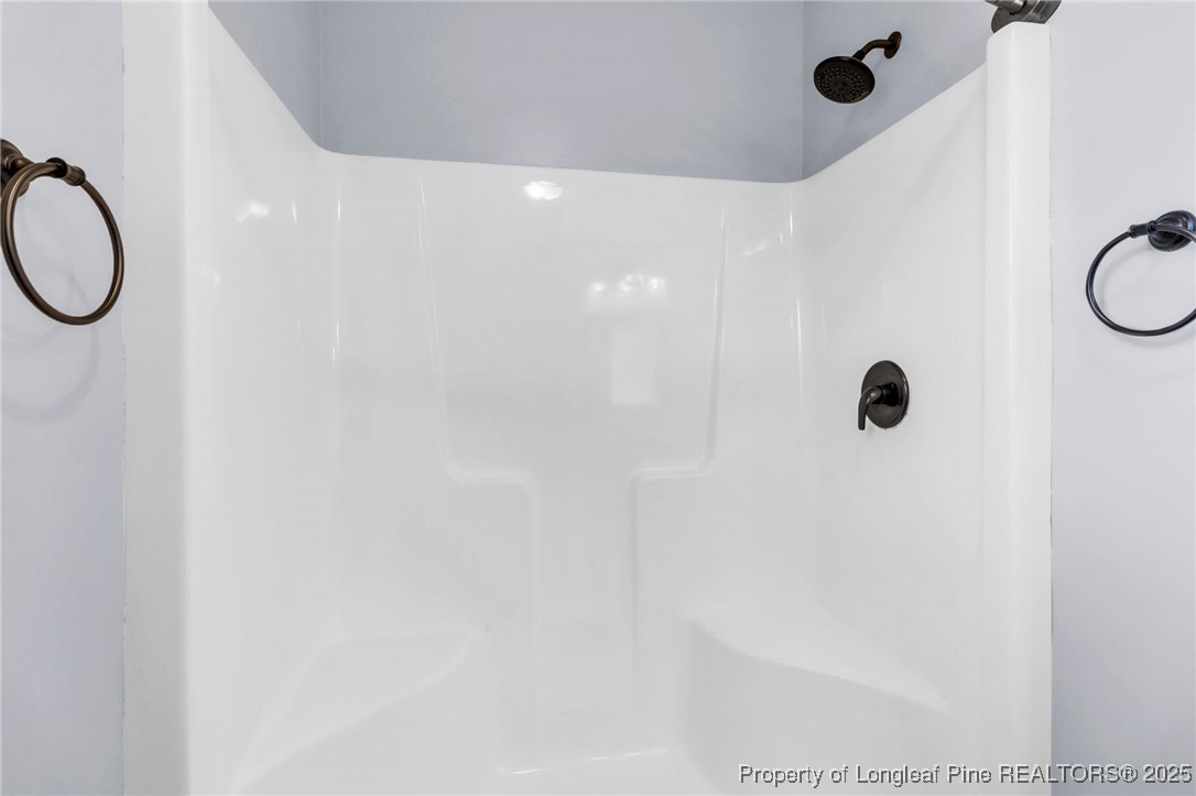 510 Hammond Farms Road Hope Mills, NC 28348 - Photo 20 of 49 a bathroom with a shower