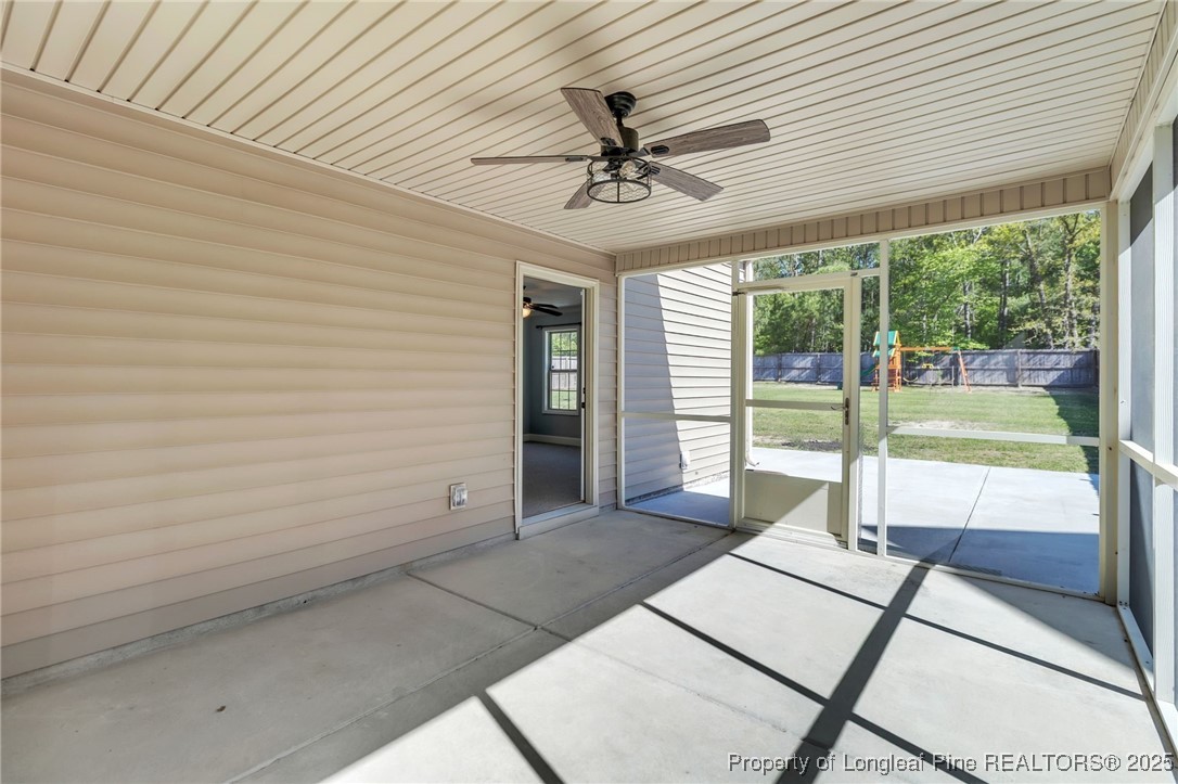 510 Hammond Farms Road Hope Mills, NC 28348 - Photo 36 of 49 a view of a livingroom with a ceiling fan and balcony
