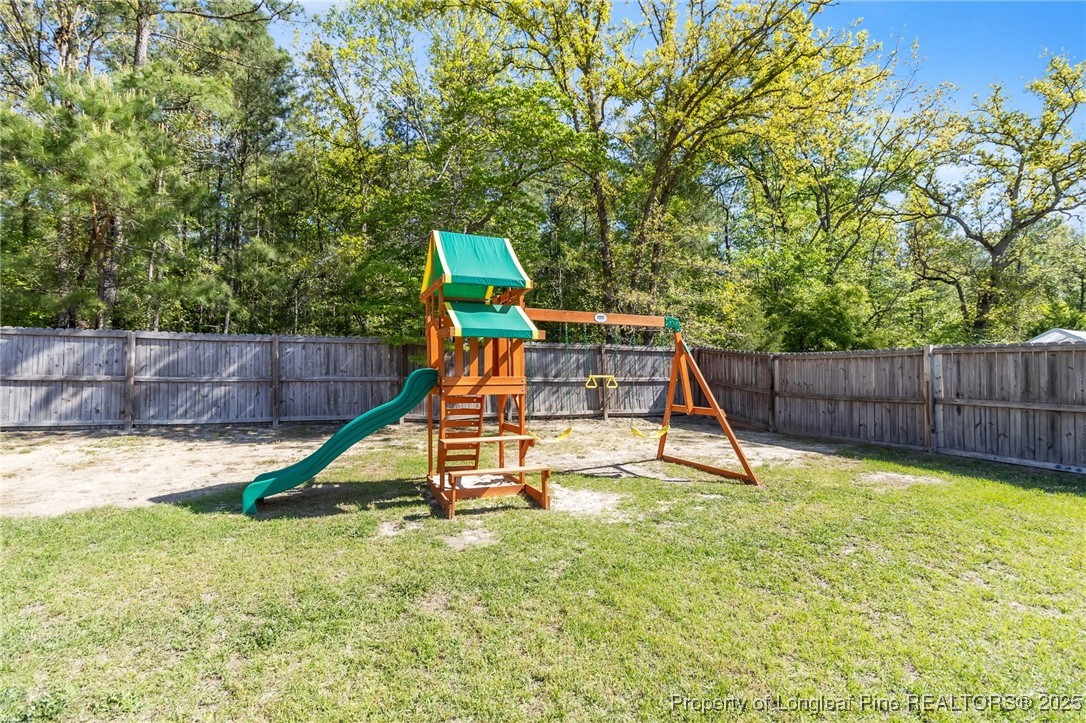 510 Hammond Farms Road Hope Mills, NC 28348 - Photo 38 of 49 a view of a slide with a slide