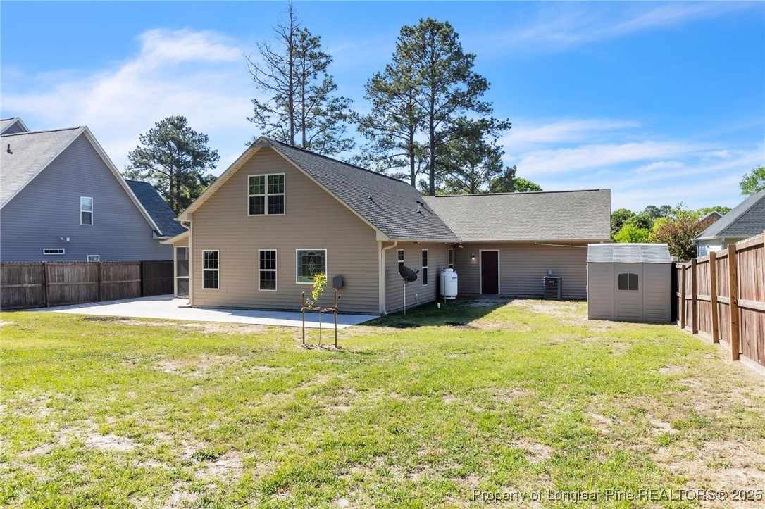510 Hammond Farms Road Hope Mills, NC 28348 - Photo 41 of 49 a house view with a sitting space and garden
