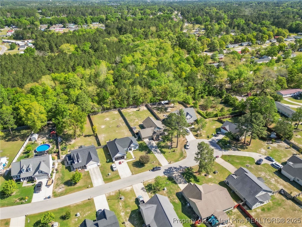 510 Hammond Farms Road Hope Mills, NC 28348 - Photo 42 of 49 an aerial view of residential houses with outdoor space