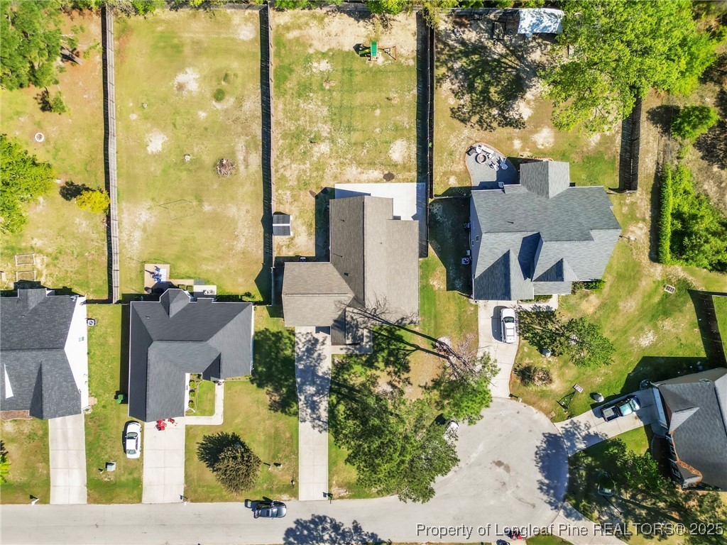 510 Hammond Farms Road Hope Mills, NC 28348 - Photo 43 of 49 an aerial view of residential houses with outdoor space