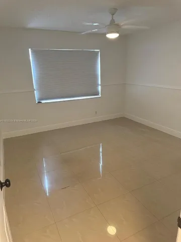 a view of a closet in a bathroom
