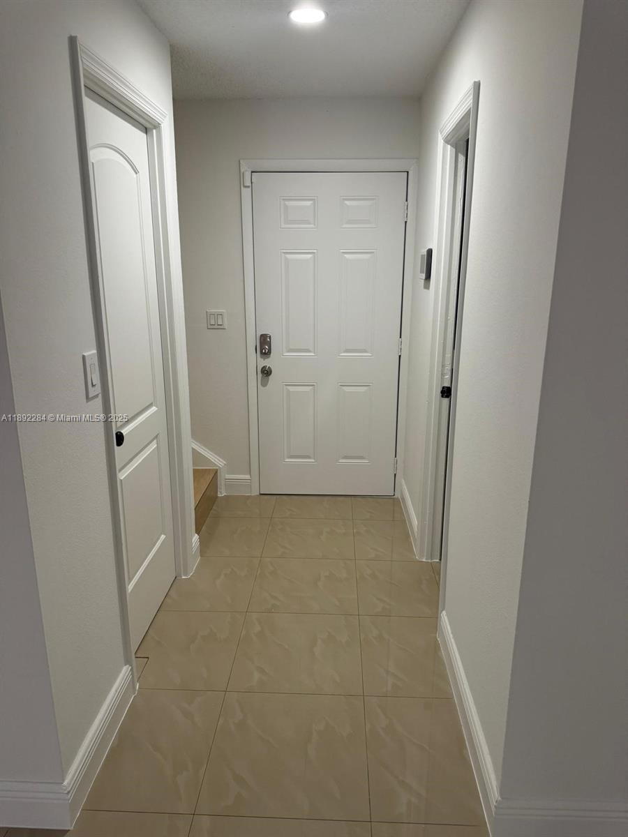 18101 Northwest 68th Avenue, Unit D207 Hialeah, FL 33015 - Photo 8 of 18 a view of a bathroom