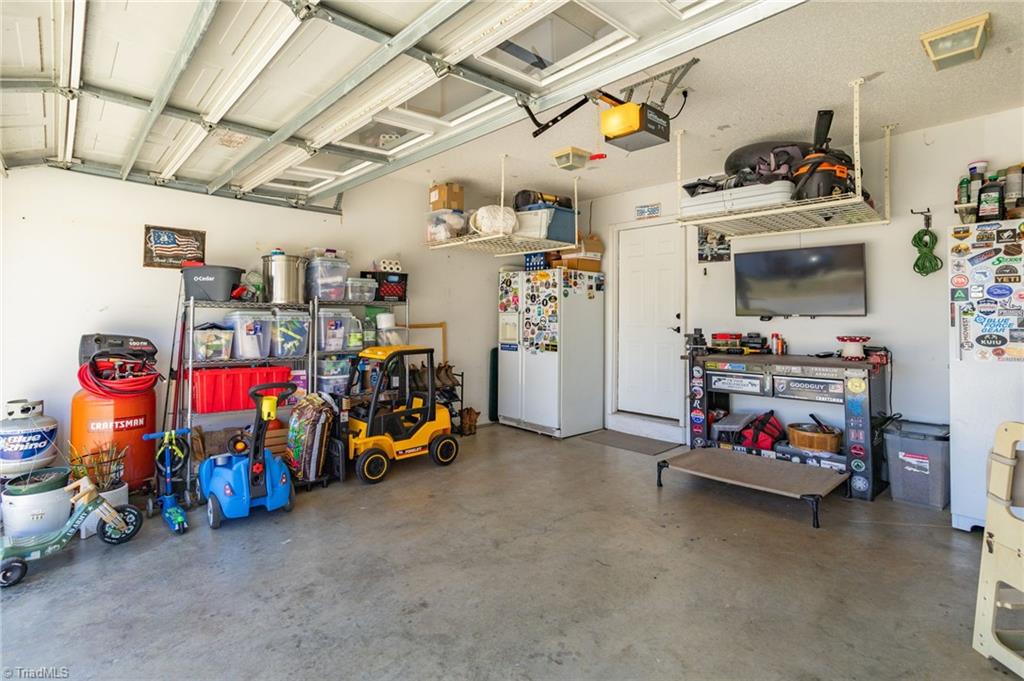 3564 Millie Lane Pfafftown, NC 27040 - Photo 35 of 40 Garage with shelving