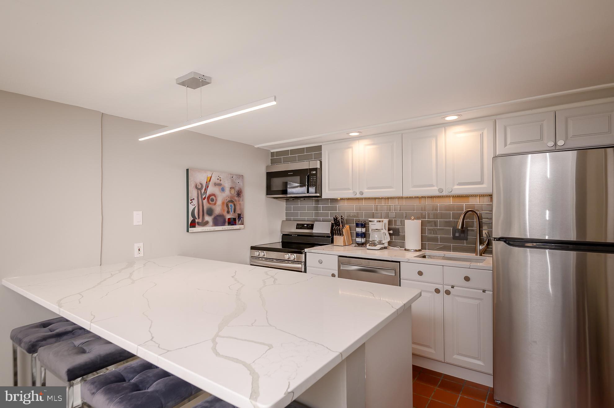 709 3rd Street Northeast Washington, DC 20002 - Photo 33 of 39 Fully equipped kitchen