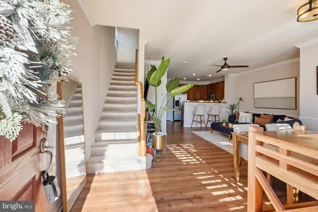 a lobby with furniture and rug
