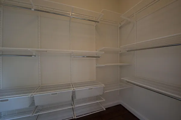 a view of a room with racks on the wall