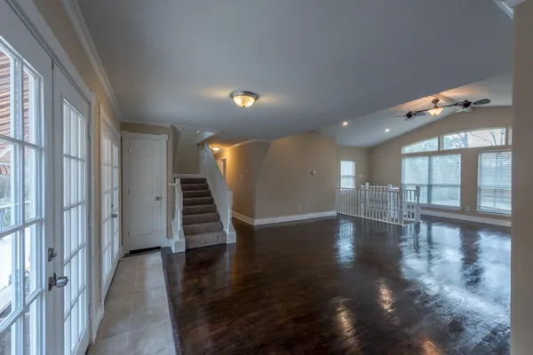 a kitchen with stainless steel appliances granite countertop a stove and a refrigerator