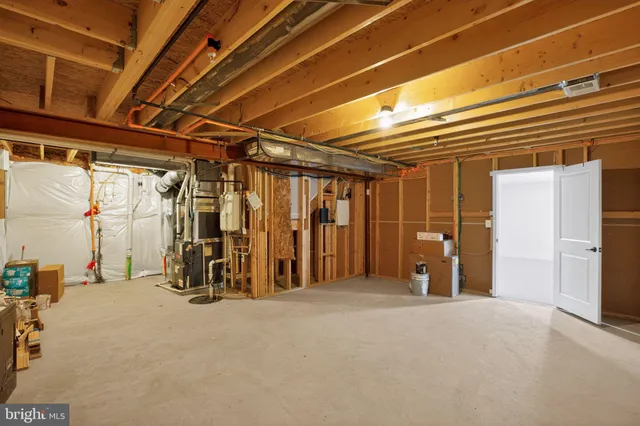 a view of a balcony with wooden floor and bench