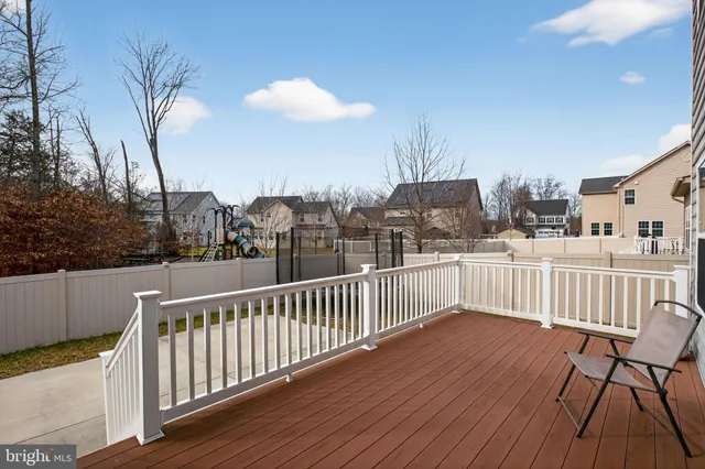 a view of a house with a yard and garage