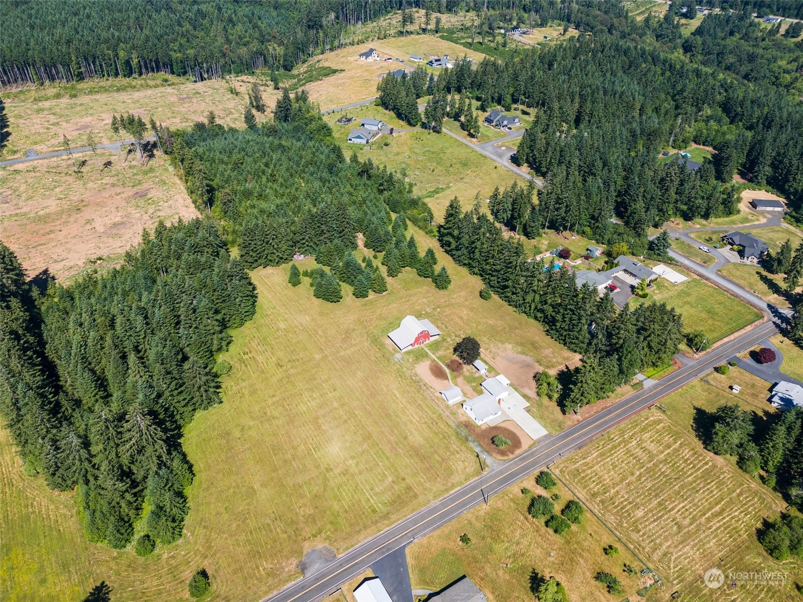 204 Monroe Road Winlock, WA 98596 - Photo 5 of 38 a view of a swimming pool with a yard