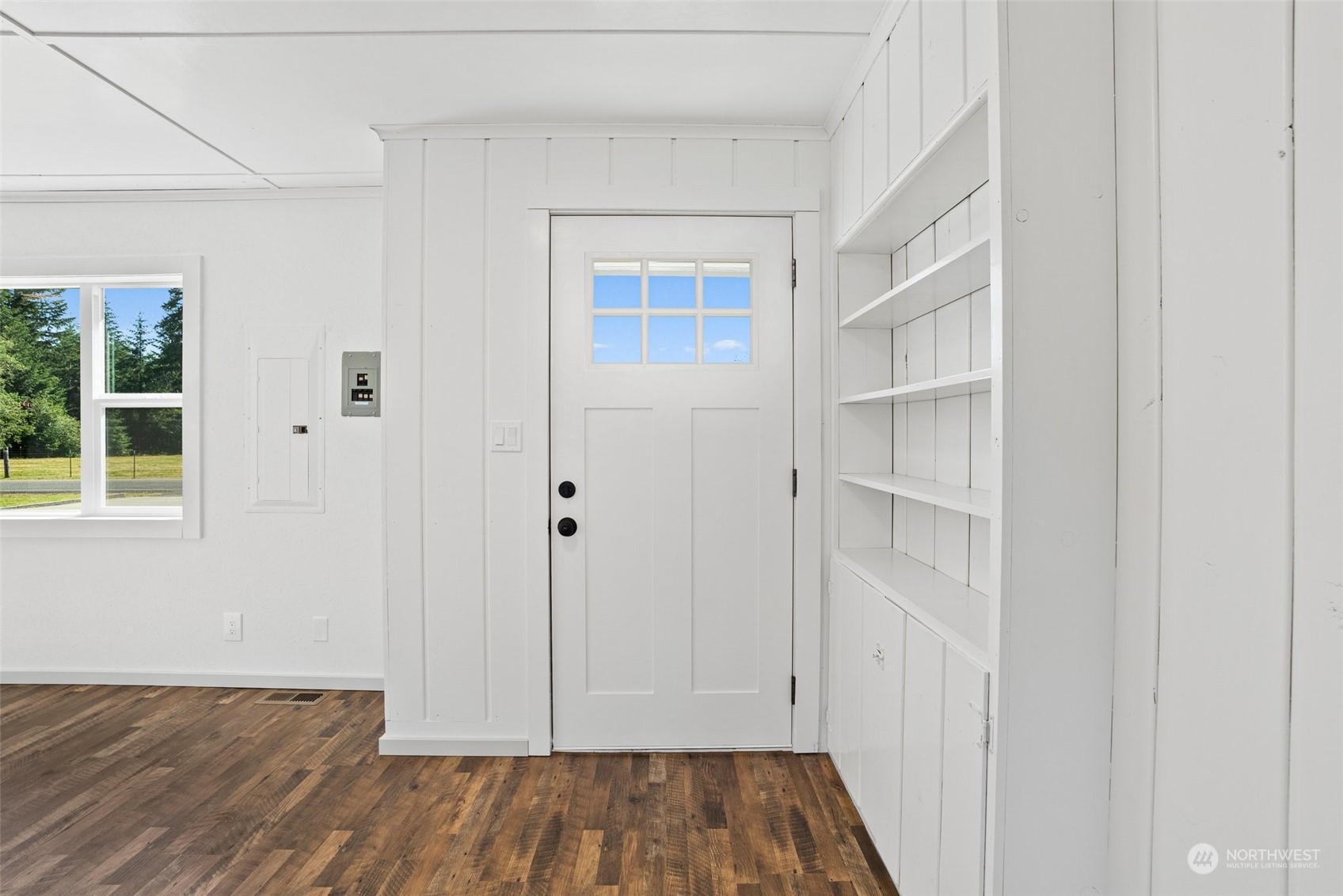 204 Monroe Road Winlock, WA 98596 - Photo 9 of 38 a view of empty room with wooden floor and fan