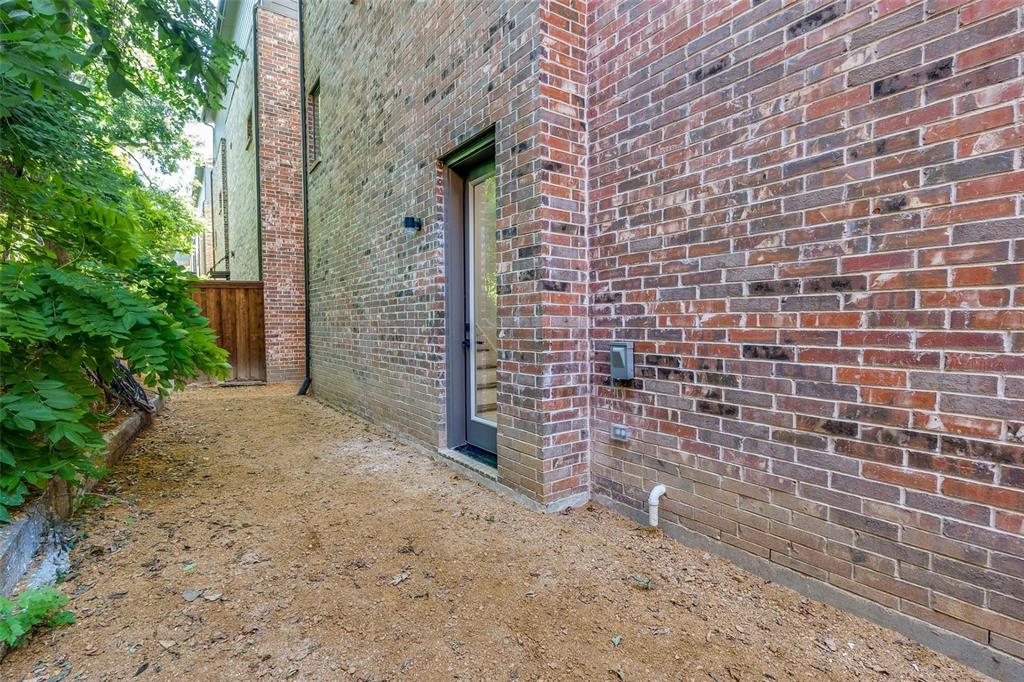1552 Cosette Drive Dallas, TX 75215 - Photo 20 of 23 Property entrance featuring brick siding