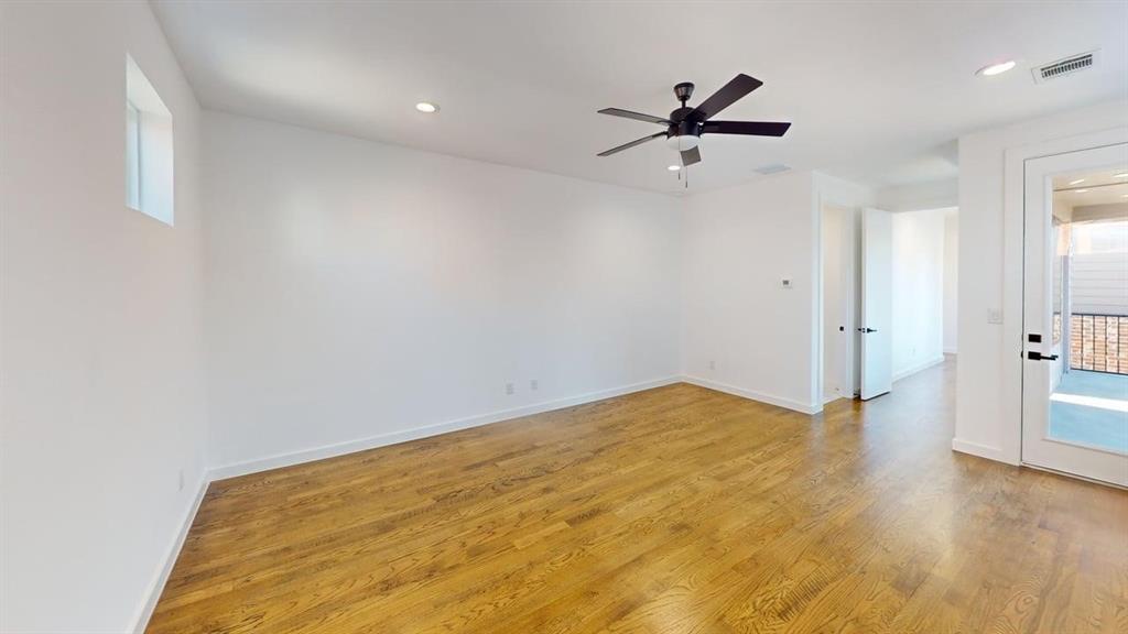 1552 Cosette Drive Dallas, TX 75215 - Photo 10 of 23 Empty room featuring light wood-style flooring, ceiling fan, and recessed lighting