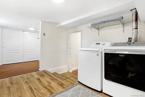 a bedroom with a stove and a sink