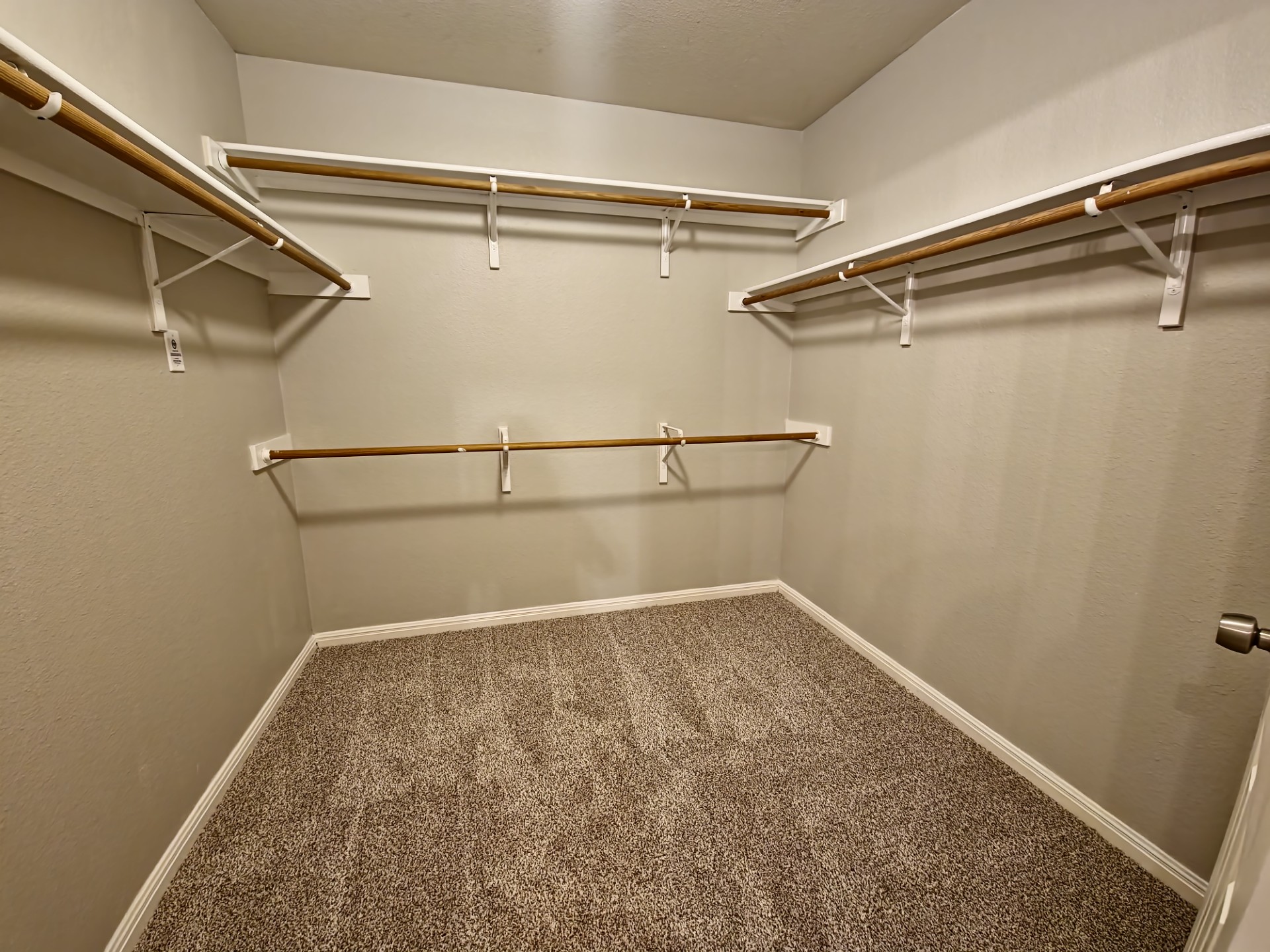 107 Orange Tree Lane Georgetown, TX 78626 - Photo 12 of 16 Ample hanging and storage space provided by a well-appointed walk-in closet.