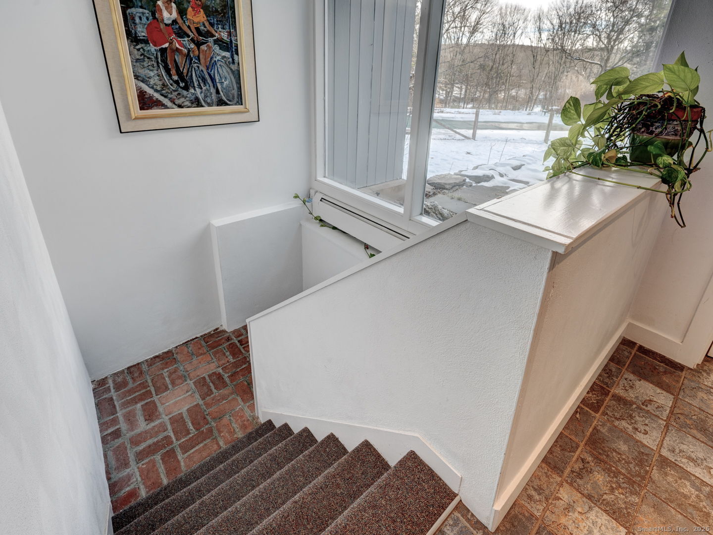 415 South Street Litchfield, CT 06759 - Photo 28 of 40 a living room with furniture and a potted plant