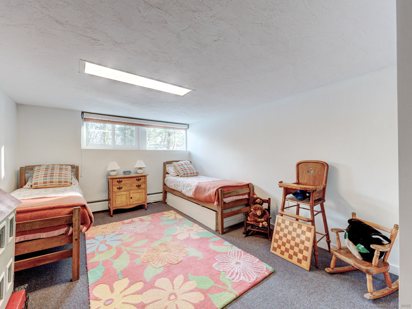 415 South Street Litchfield, CT 06759 - Photo 30 of 40 a bedroom with furniture and a window