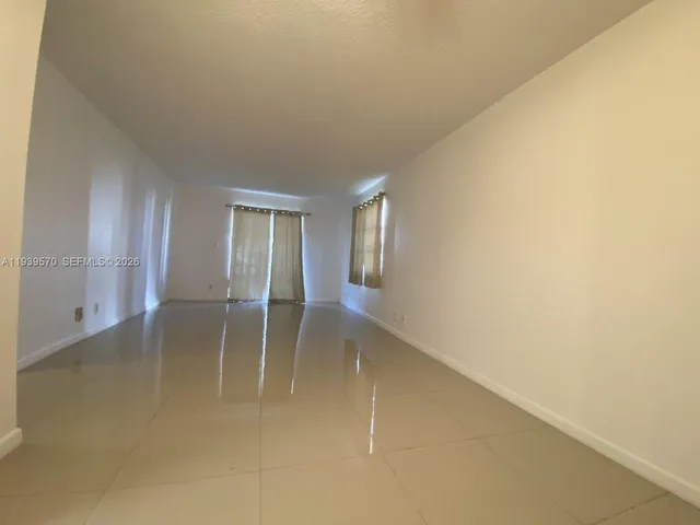 an empty room with window