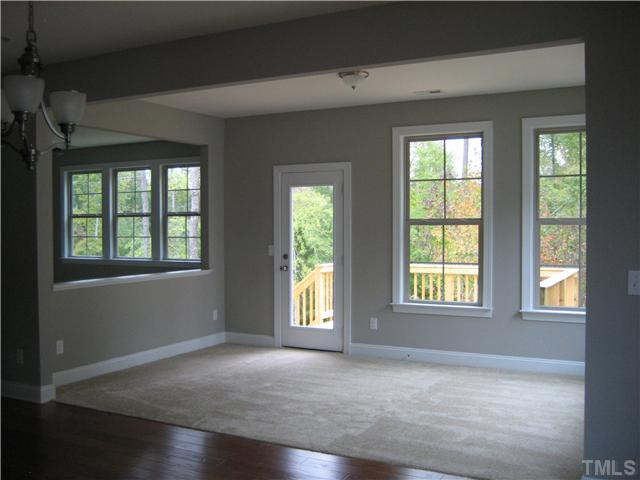 2133 Lower Lake Road Wake Forest, NC 27587 - Photo 10 of 25 View of Morning Room off Breakfast Opens to Family room with Half wall and 10x12 Deck