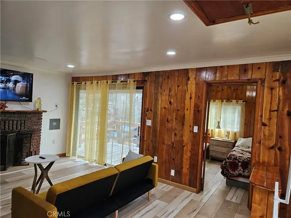 a room with furniture and a fireplace