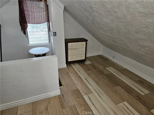 a view of staircase with a rug