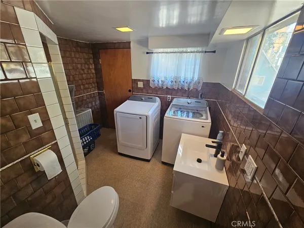 a room with furniture and a mirror