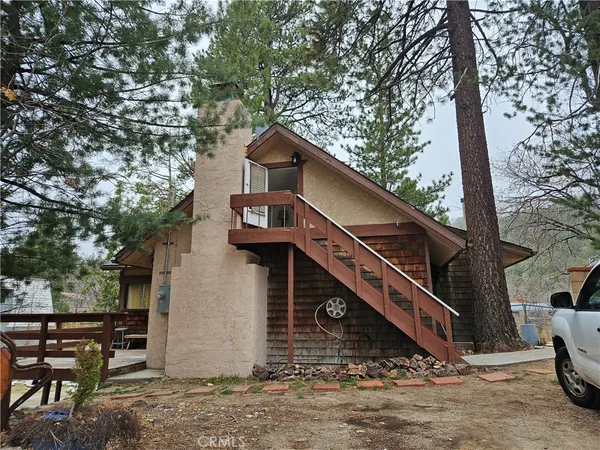 a house view with a outdoor space