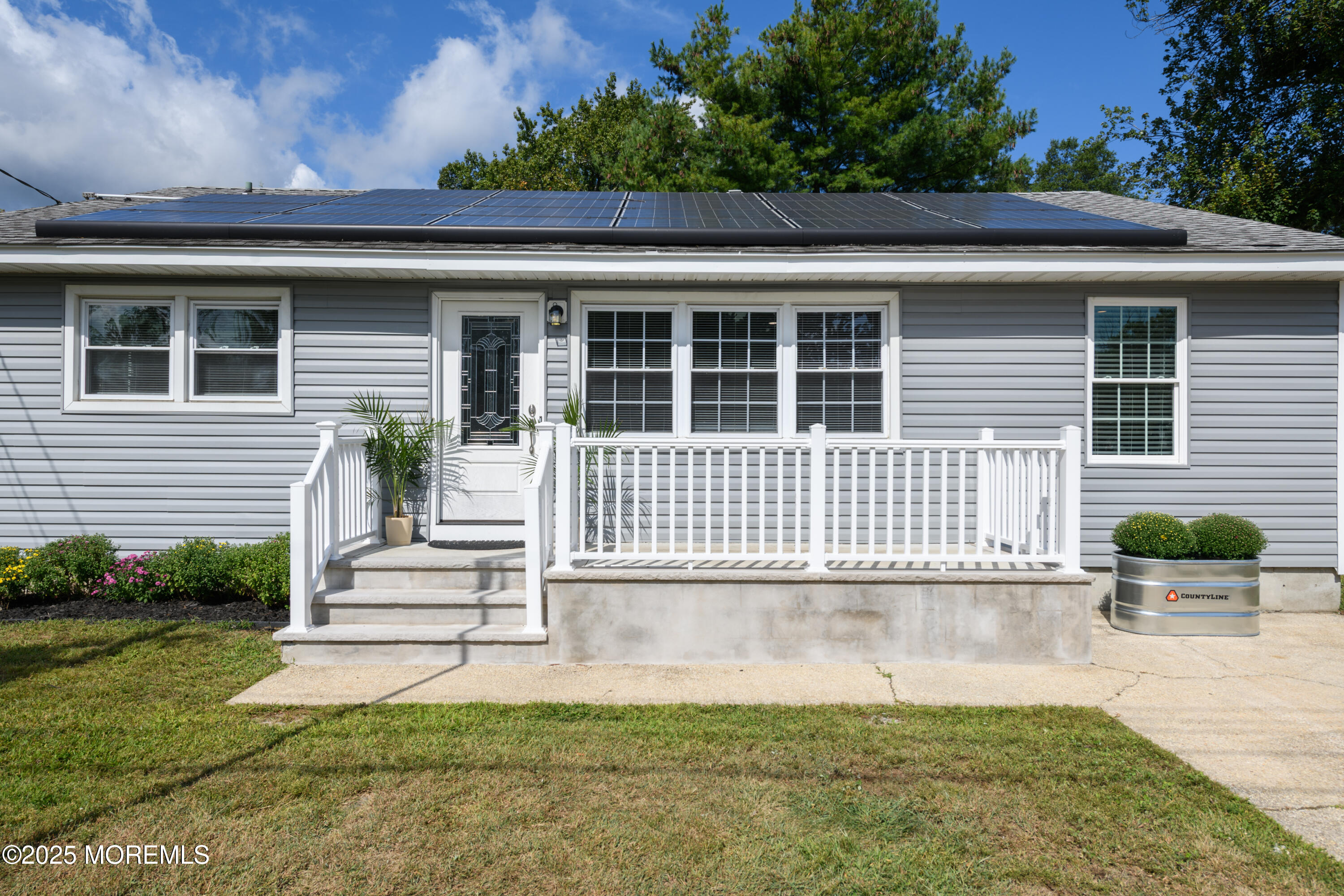 422 Maple Drive Belford, NJ 07718 - Photo 11 of 55 a front view of a house with a yard