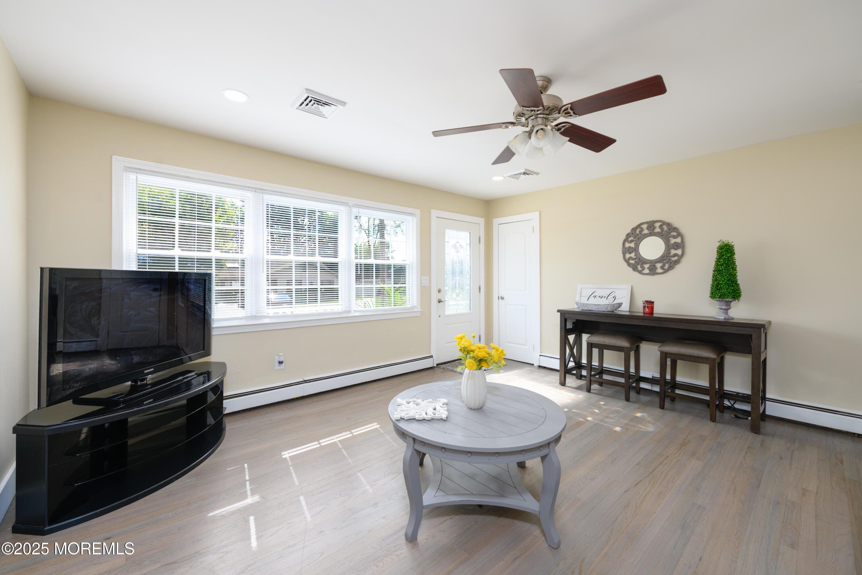 422 Maple Drive Belford, NJ 07718 - Photo 14 of 55 a view of a livingroom with furniture and a window