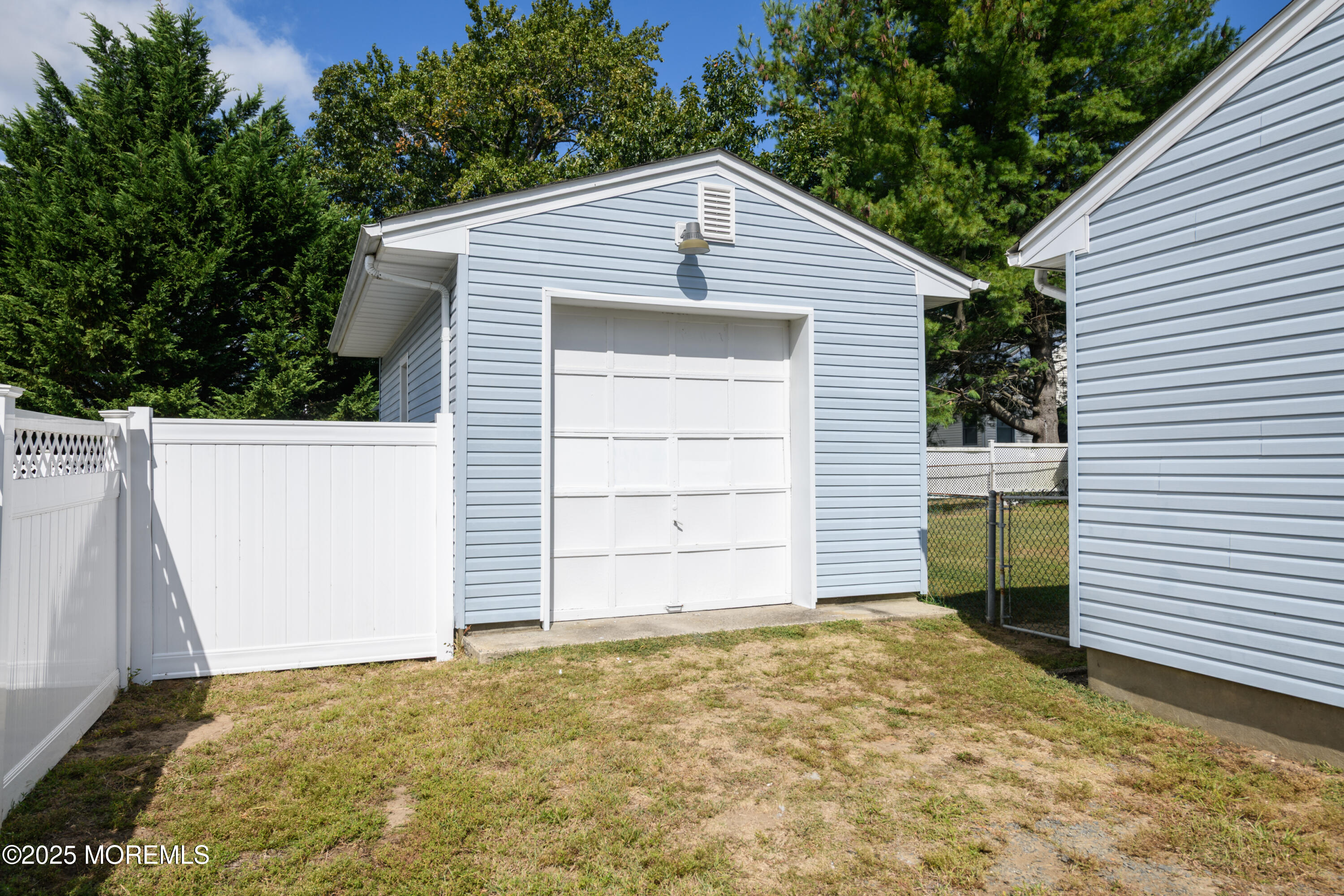422 Maple Drive Belford, NJ 07718 - Photo 29 of 55 a view of a house with a garage