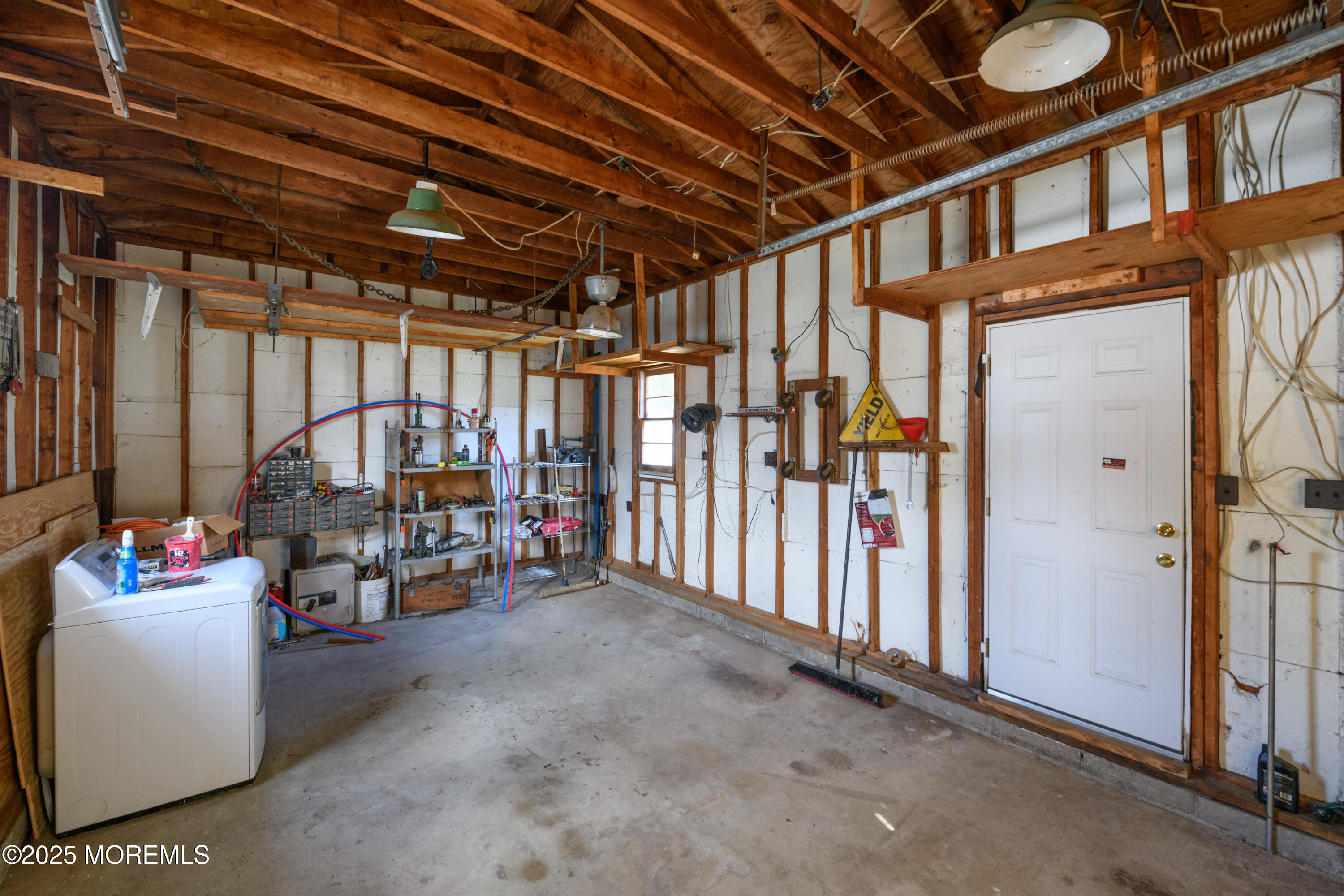 422 Maple Drive Belford, NJ 07718 - Photo 31 of 55 a view of a storage room with a lot of stuff