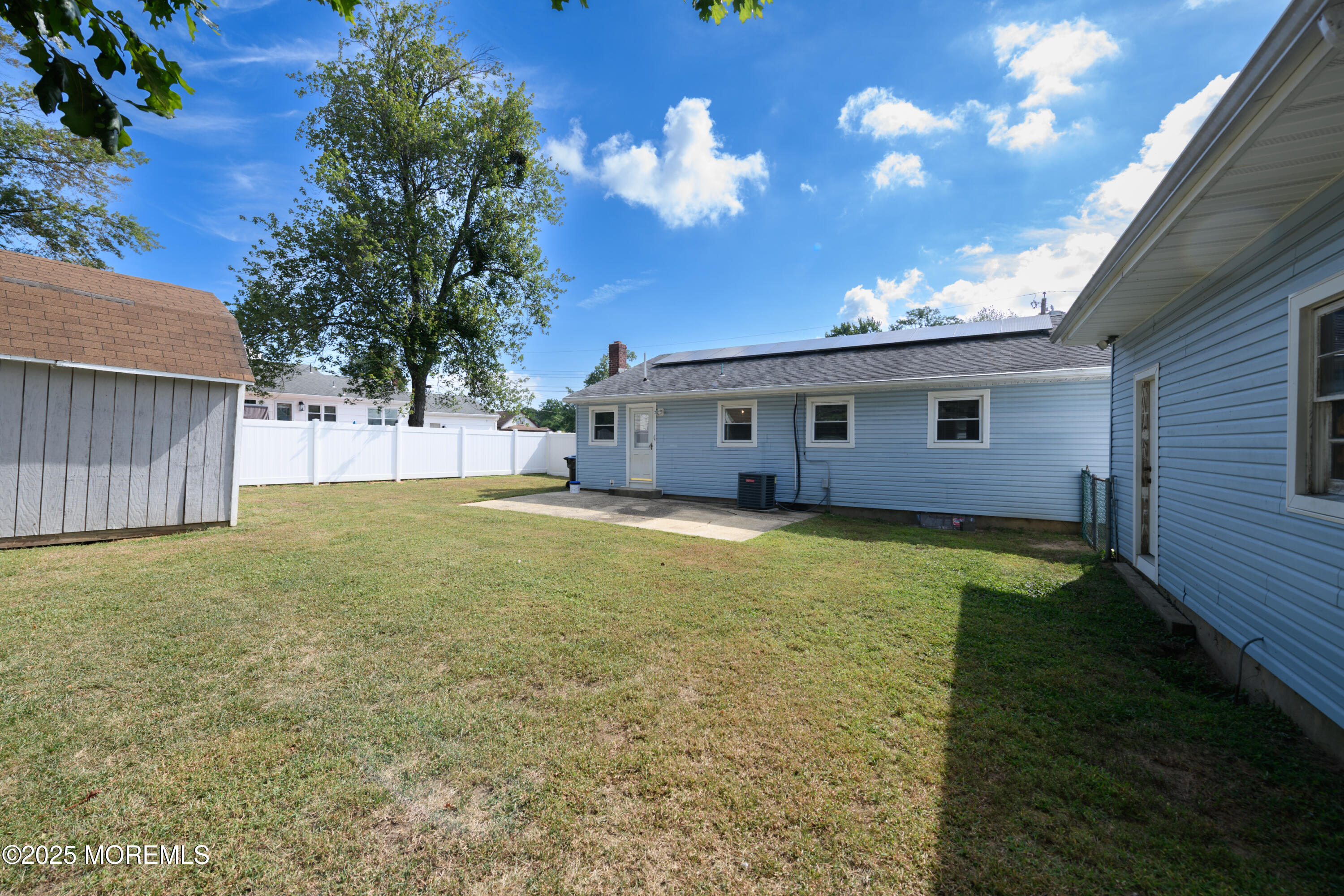 422 Maple Drive Belford, NJ 07718 - Photo 35 of 55 a view of a house with a backyard
