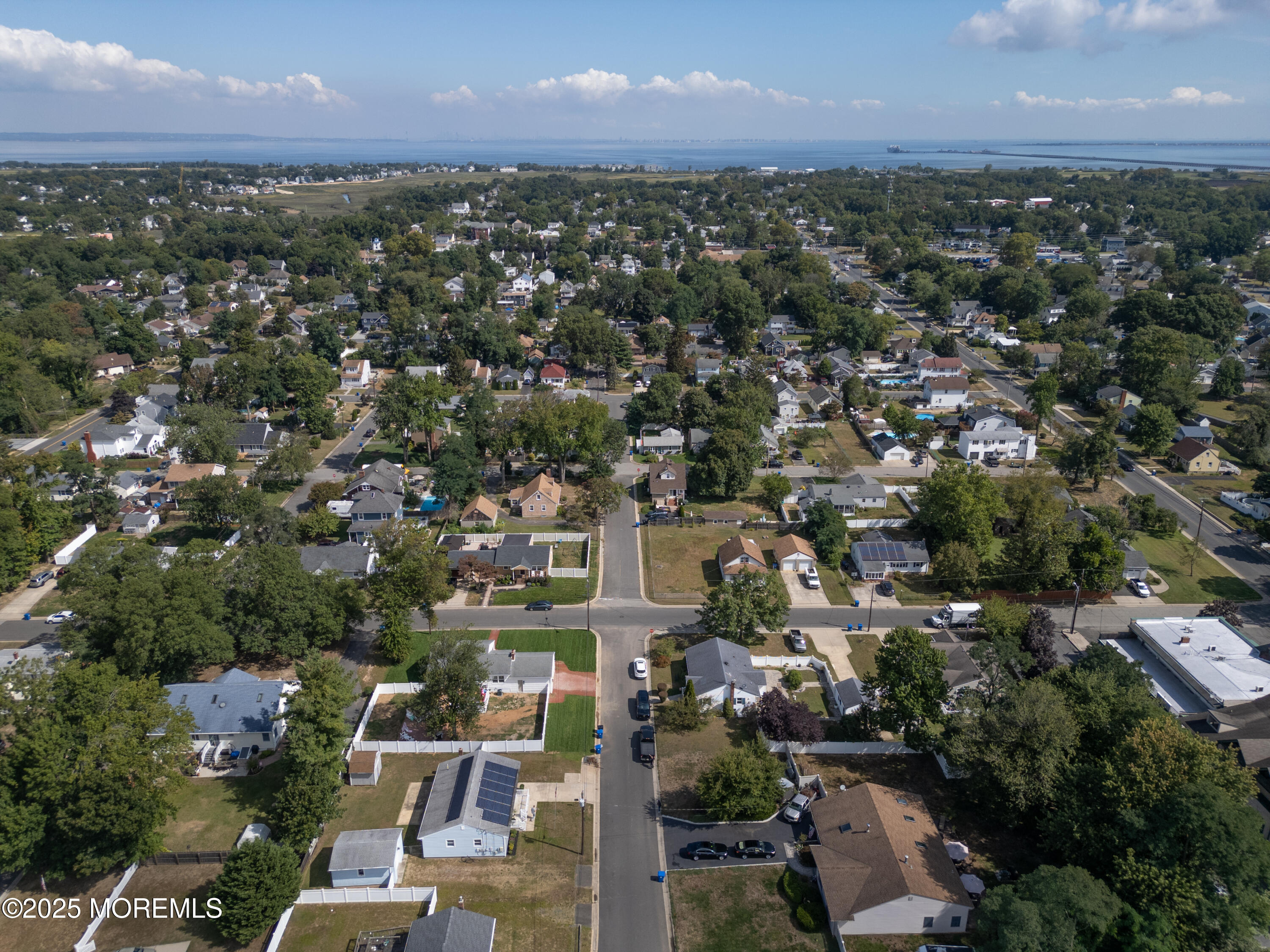 422 Maple Drive Belford, NJ 07718 - Photo 38 of 55 an aerial view of a city with lots of residential buildings