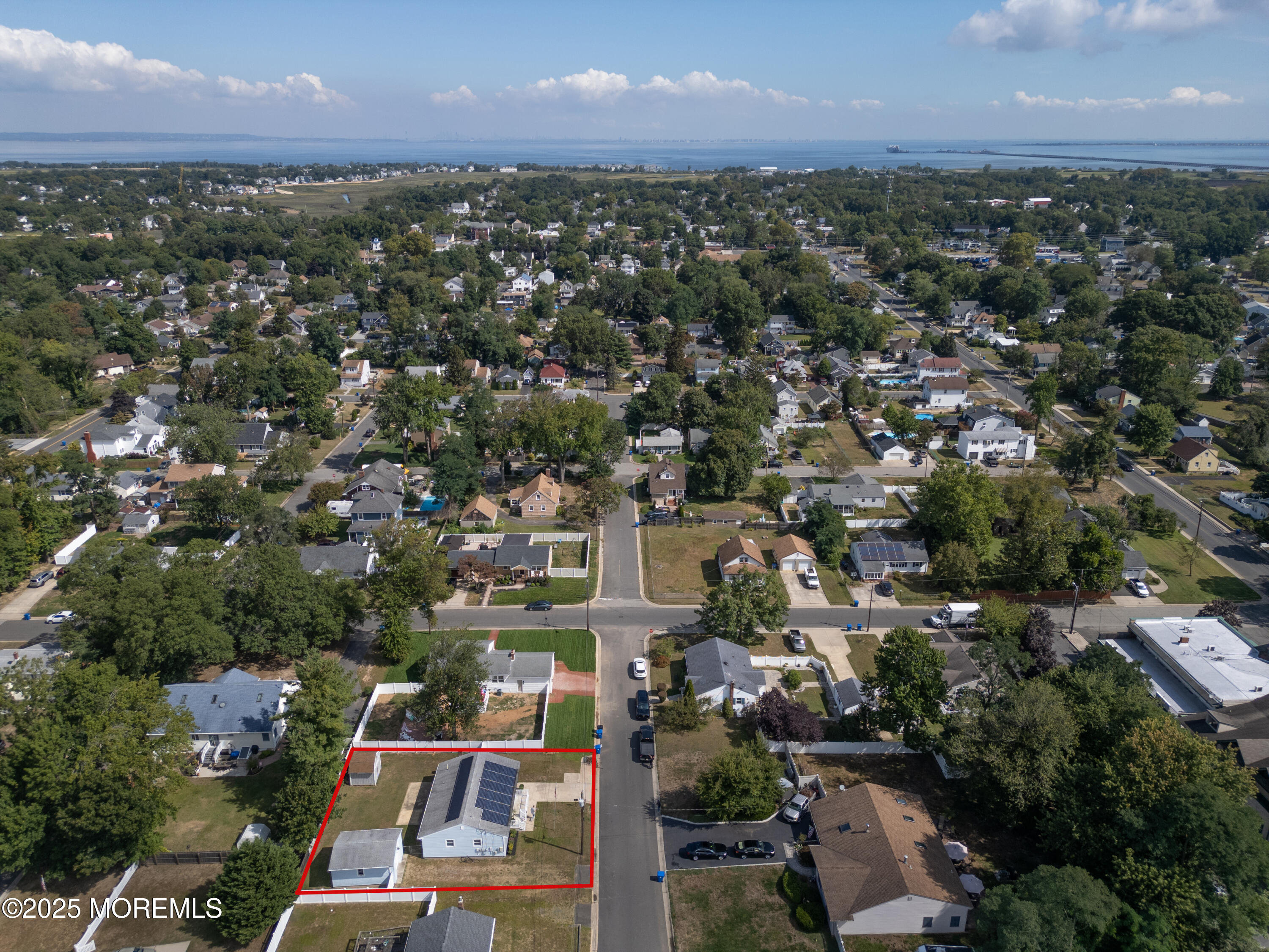 422 Maple Drive Belford, NJ 07718 - Photo 39 of 55 an aerial view of residential houses with city view