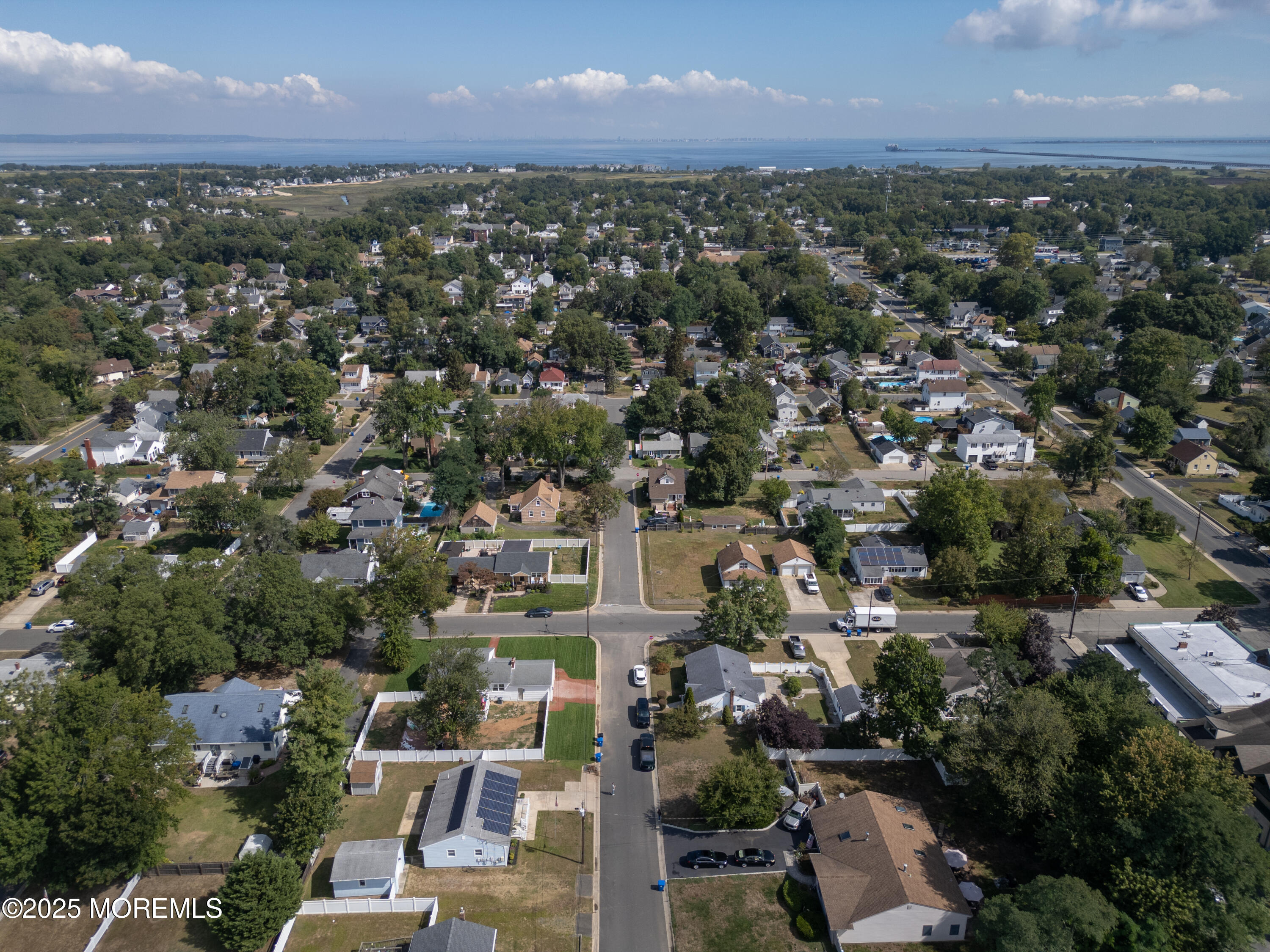 422 Maple Drive Belford, NJ 07718 - Photo 40 of 55 an aerial view of a city with lots of residential buildings