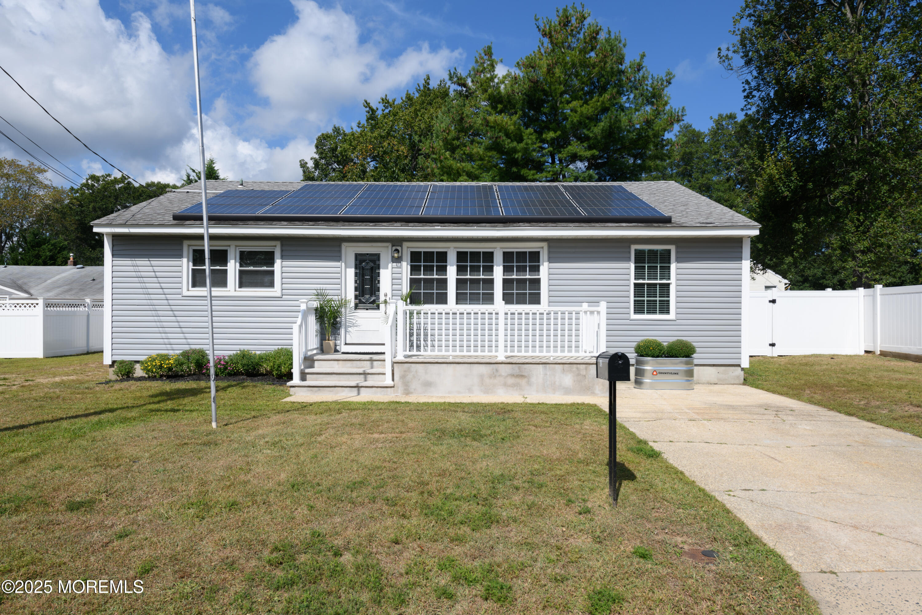 422 Maple Drive Belford, NJ 07718 - Photo 4 of 55 front view of a house with a yard