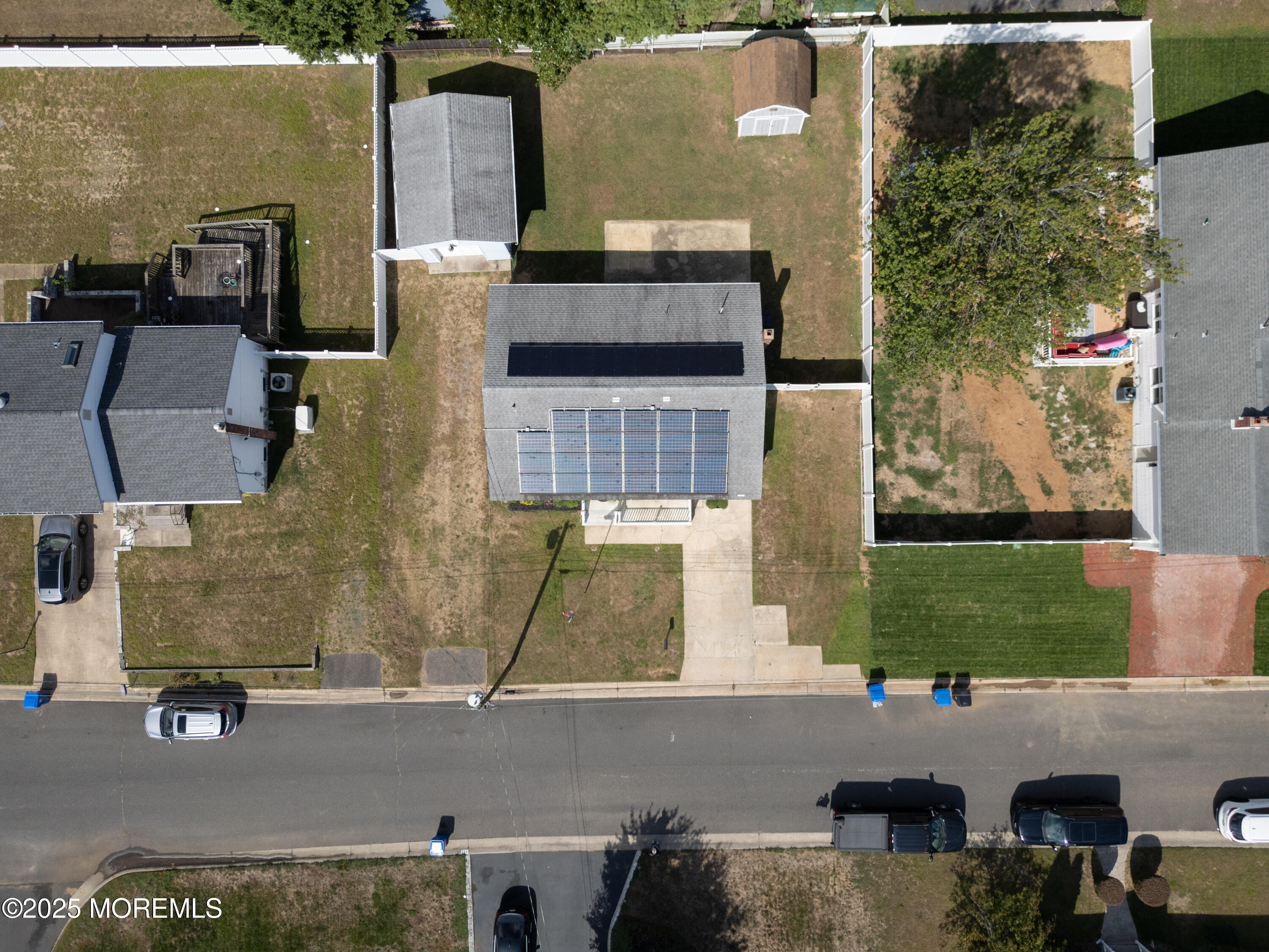 422 Maple Drive Belford, NJ 07718 - Photo 45 of 55 an aerial view of a house with a yard