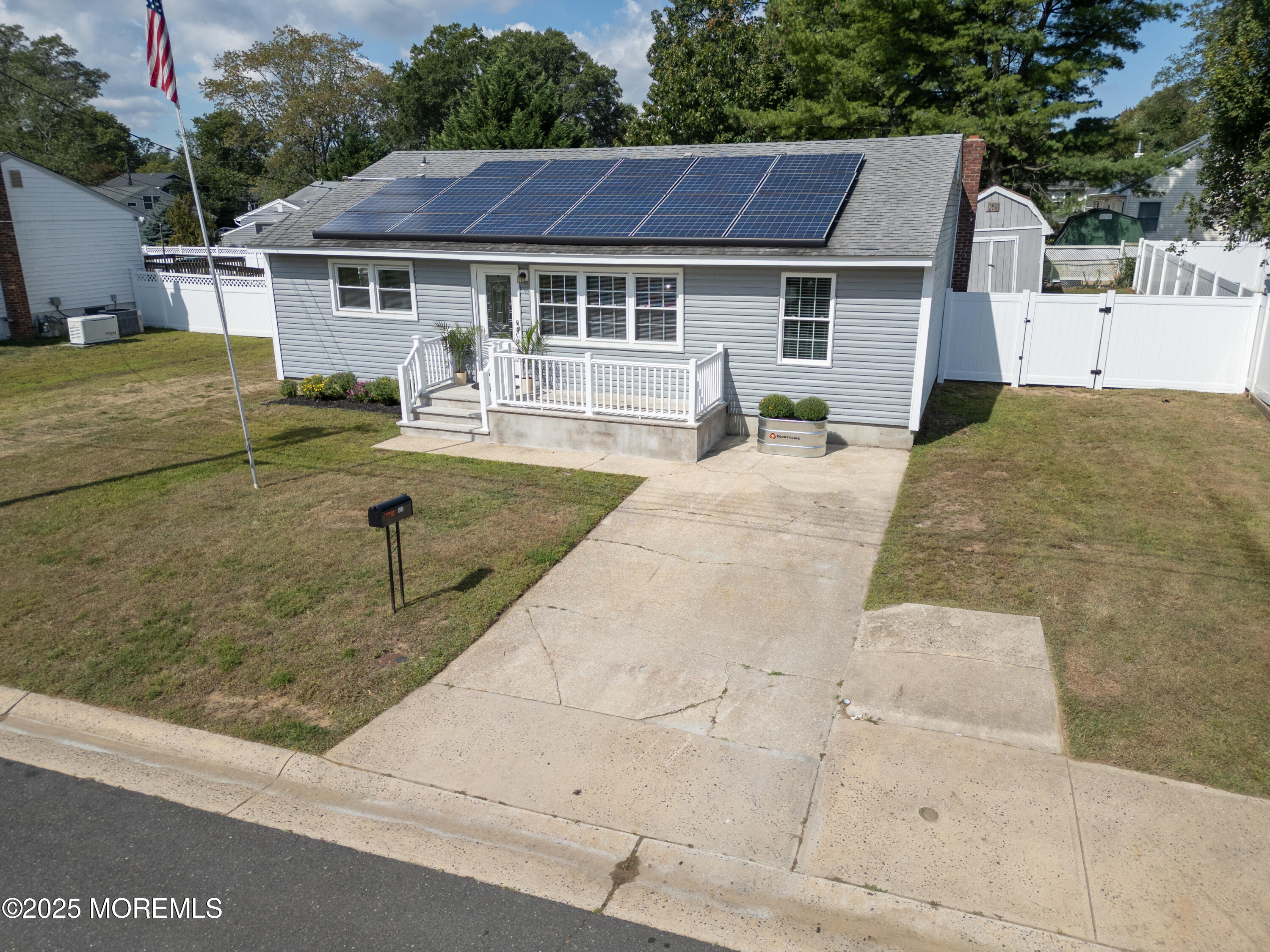 422 Maple Drive Belford, NJ 07718 - Photo 47 of 55 a front view of a house with yard