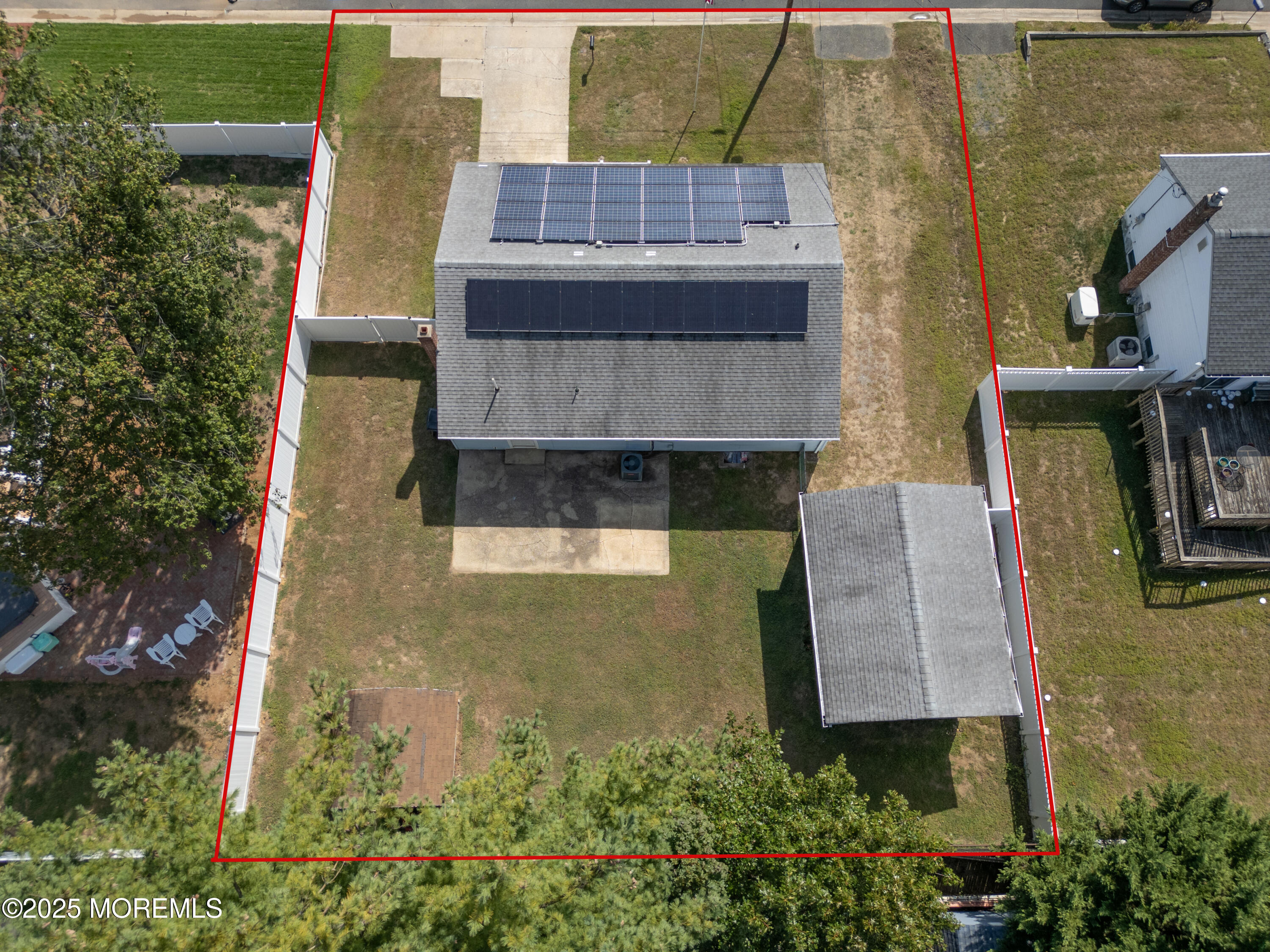 422 Maple Drive Belford, NJ 07718 - Photo 50 of 55 an aerial view of a house with a garden
