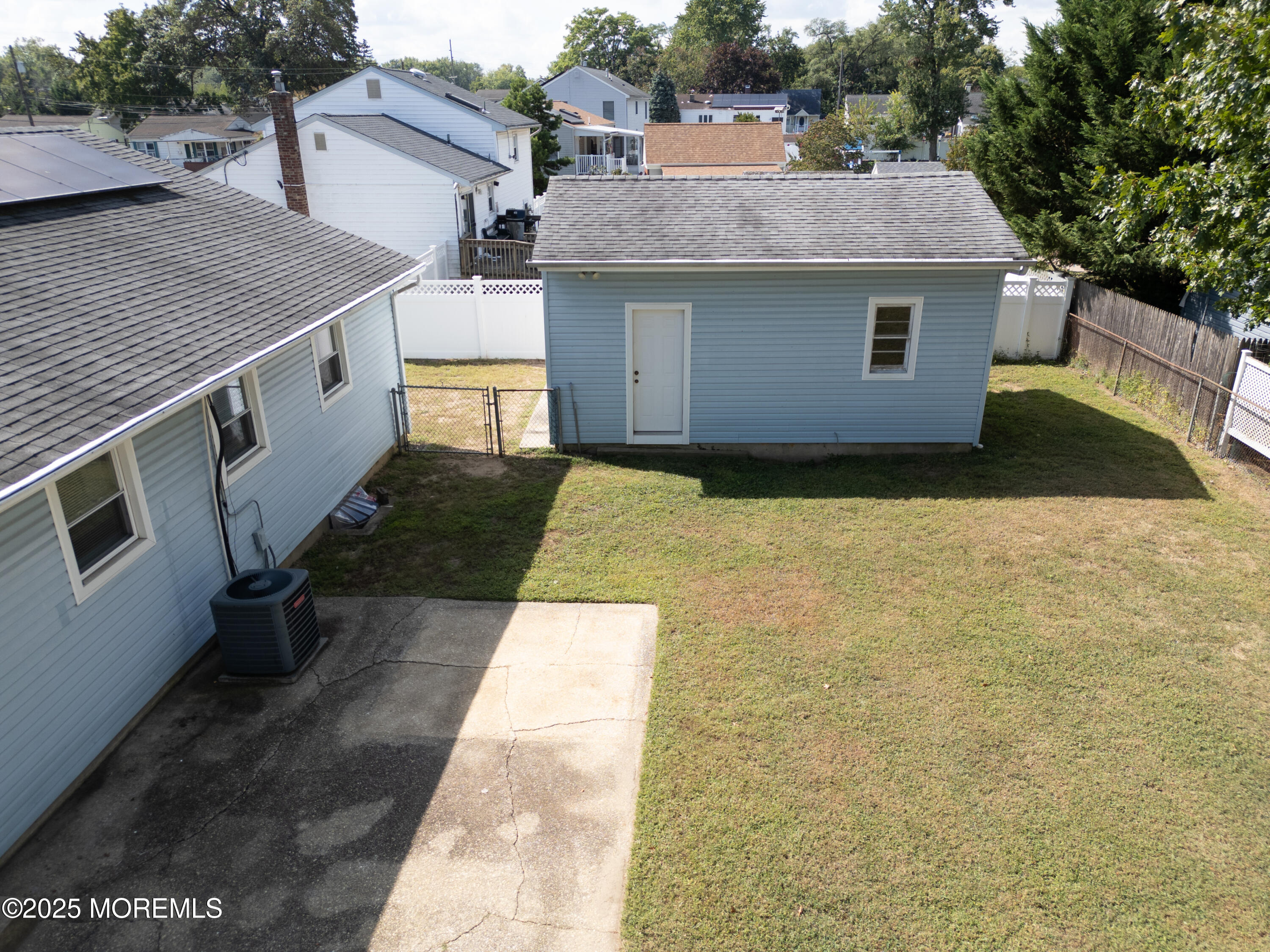 422 Maple Drive Belford, NJ 07718 - Photo 52 of 55 a aerial view of a house with a yard