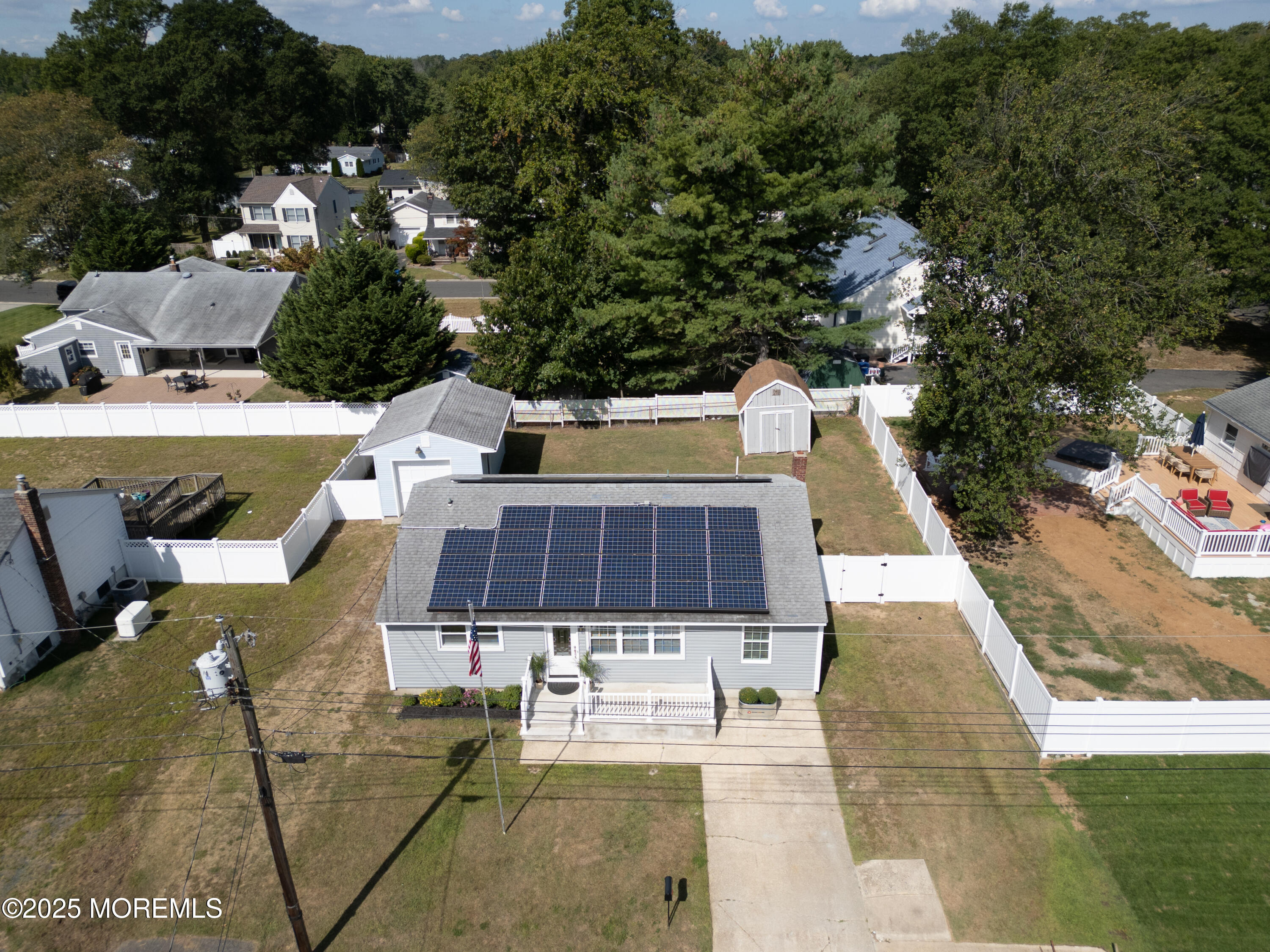 422 Maple Drive Belford, NJ 07718 - Photo 10 of 55 an aerial view of a house with swimming pool and patio