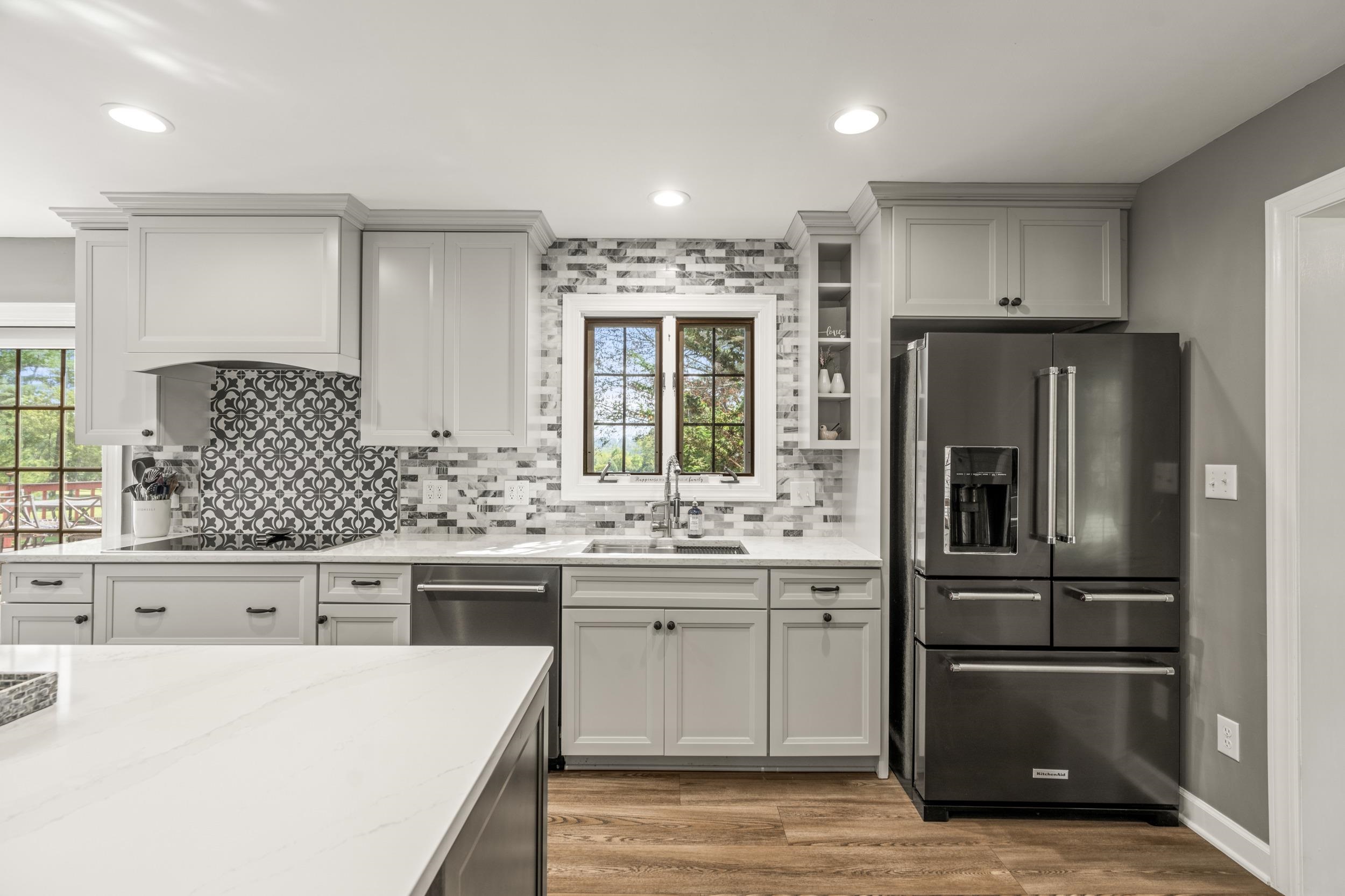 1109 Ross Road Lexington, VA 24450 - Photo 19 of 71 a kitchen with kitchen island a sink stove and refrigerator