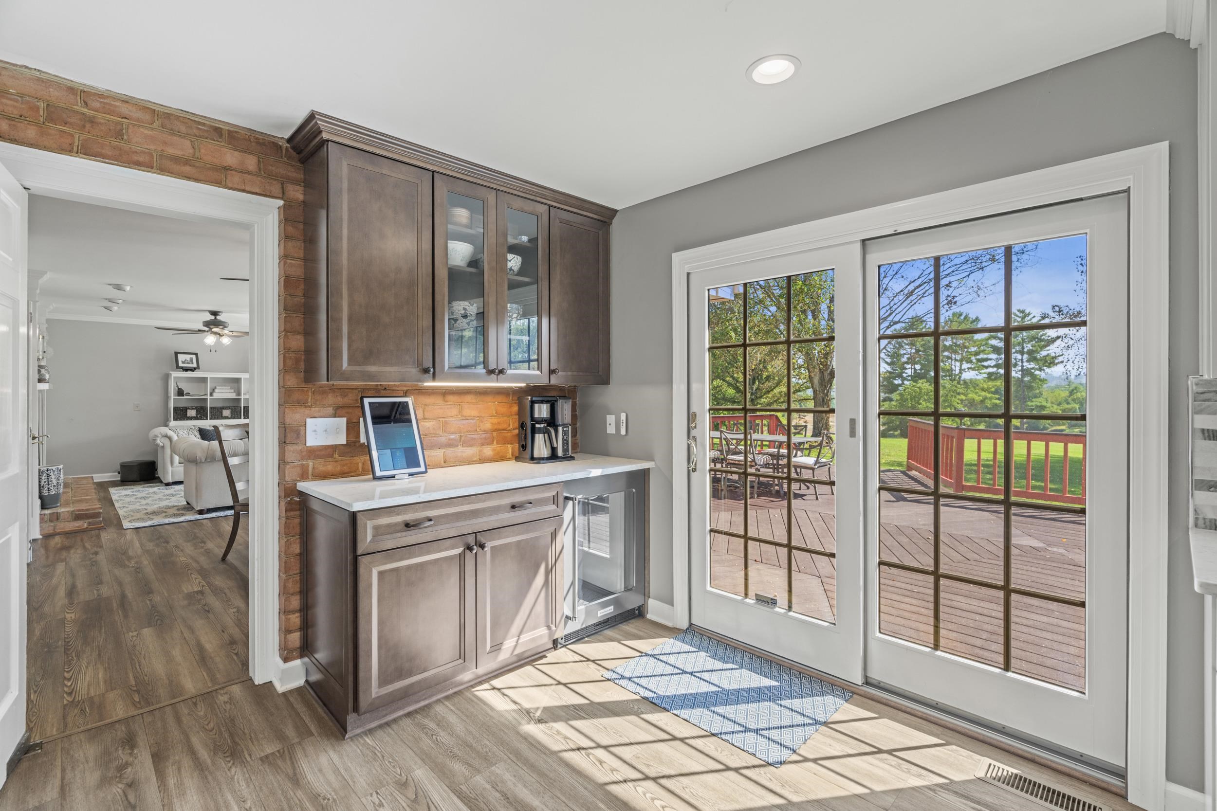 1109 Ross Road Lexington, VA 24450 - Photo 20 of 71 a kitchen with stainless steel appliances granite countertop a stove and a sink